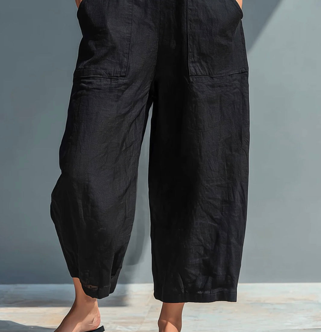 Paula | Mono minimalista de lino para mujer, sin mangas, cuello alto y botones